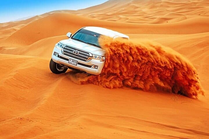 Desert safari near Ras Al Khaimah with camel ride and BBQ — Adventure things to do in Ras Al Khaimah
