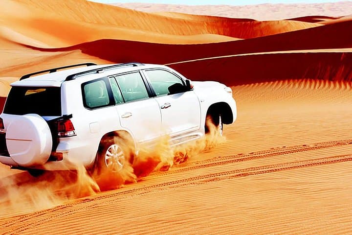 Red dunes safari with sandboarding and camel rides from Ras Al Khaimah — Nature & wildlife things to do in Ras Al Khaimah
